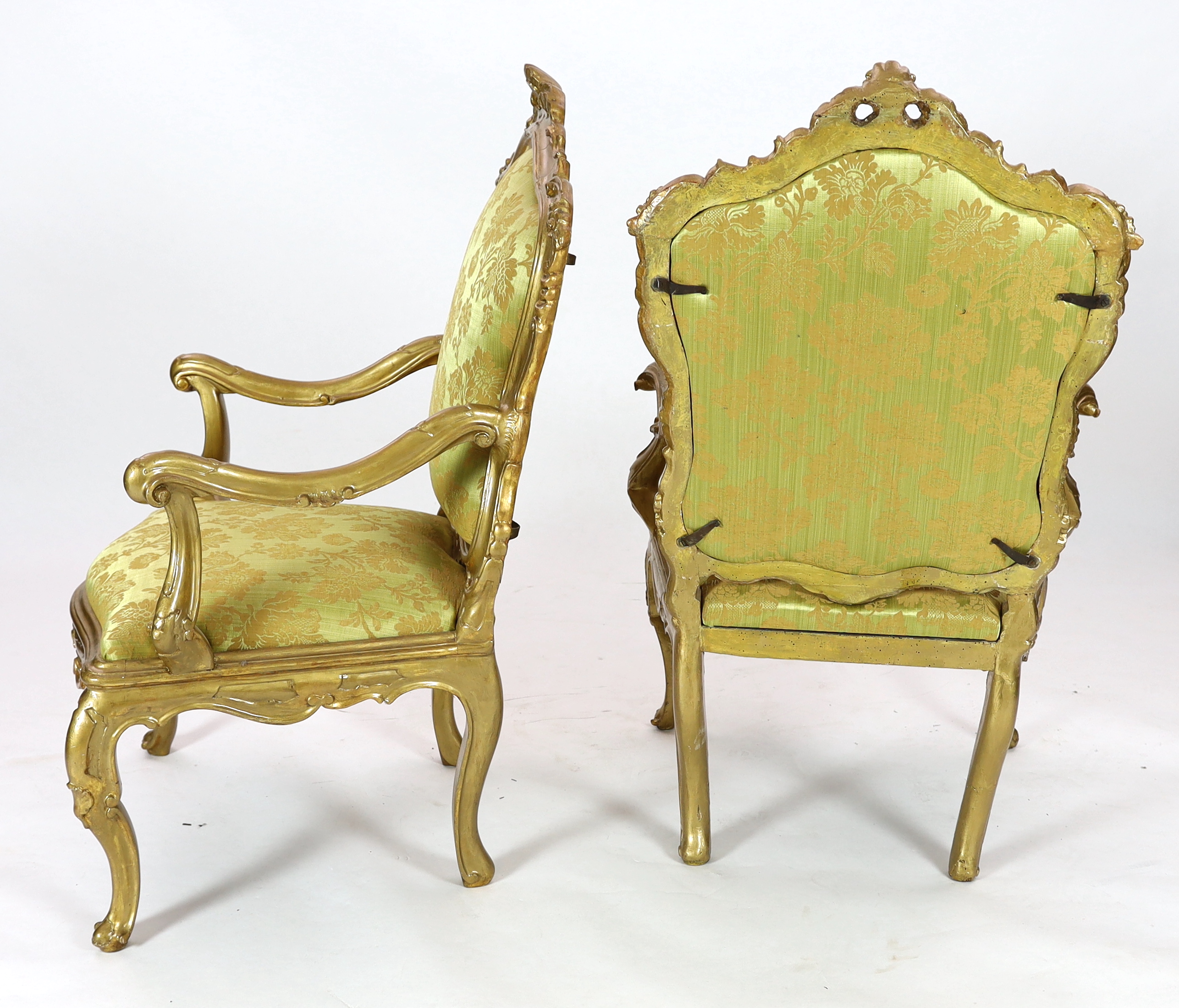 A set of six 18th century Venetian carved giltwood open armchairs, Please note this lot attracts an additional import tax of 5% on the hammer price